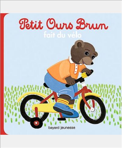 PETIT OURS BRUN FAIT DU VELO