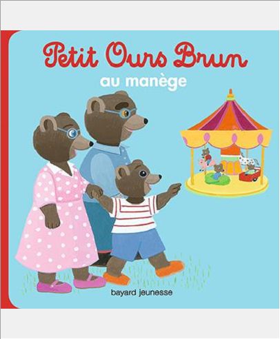 PETIT OURS BRUN AU MANEGE